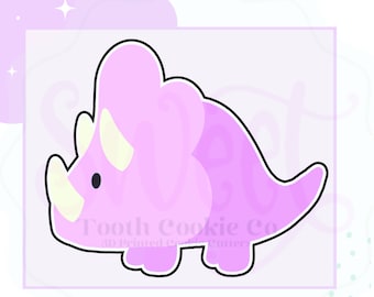 May include: A pink triceratops cookie cutter with a black outline. The cutter is designed for making cookies in the shape of a triceratops dinosaur. The text "Tooth Cookie Co. 3D Printed Cookie Cutters" is visible at the bottom of the image.