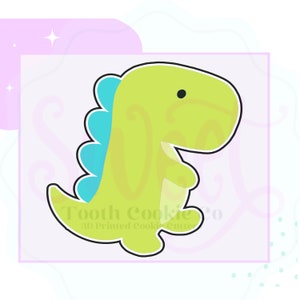 May include: A green dinosaur cookie cutter with blue spikes on its back. The cutter is in a standing position with its mouth closed and its eyes closed. The text "Tooth Cookie Co. 3D Printed Cookie Cutters" is visible at the bottom of the image.