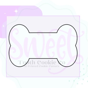 May include: A black and white outline of a dog bone cookie cutter with the word "Sweet" written inside. The cookie cutter is for making cookies.