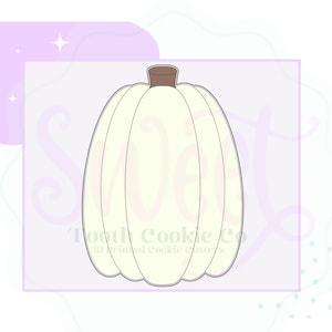 May include: A white pumpkin cookie cutter with a brown stem. The cutter is designed to create a simple, classic pumpkin shape.
