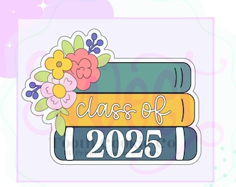May include: A stack of three books with a floral design on top. The top book is yellow and says "class of 2025".