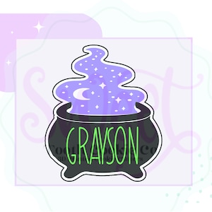 May include: A black cauldron with a purple and white smoke design. The cauldron has the name "GRAYSON" written in green letters.