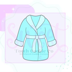May include: A light blue robe cookie cutter with a white trim and a matching belt. The cookie cutter is in the shape of a bathrobe. The text "Tooth Cookie Co" and "3D Printed Cookie Cutters" is printed on the bottom of the image.