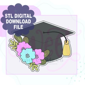 May include: A black graduation cap with a gold tassel, decorated with a floral arrangement of pink, blue, and green flowers. STL digital download file.