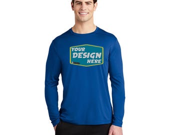Könnte beinhalten: Ein königsblaues Performance-Langarmshirt mit einem gelben und türkisfarbenen Rechteck auf der Vorderseite, auf dem "YOUR DESIGN HERE" steht.