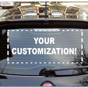 May include: A black car with a rear window that has a white sticker with the text "YOUR CUSTOMIZATION!" on it.