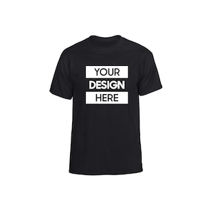 May include: Black crew neck t-shirt with the text "YOUR DESIGN HERE" in a white rectangular box. The text is stacked in three lines. The t-shirt is a basic style, suitable for custom designs or everyday wear.