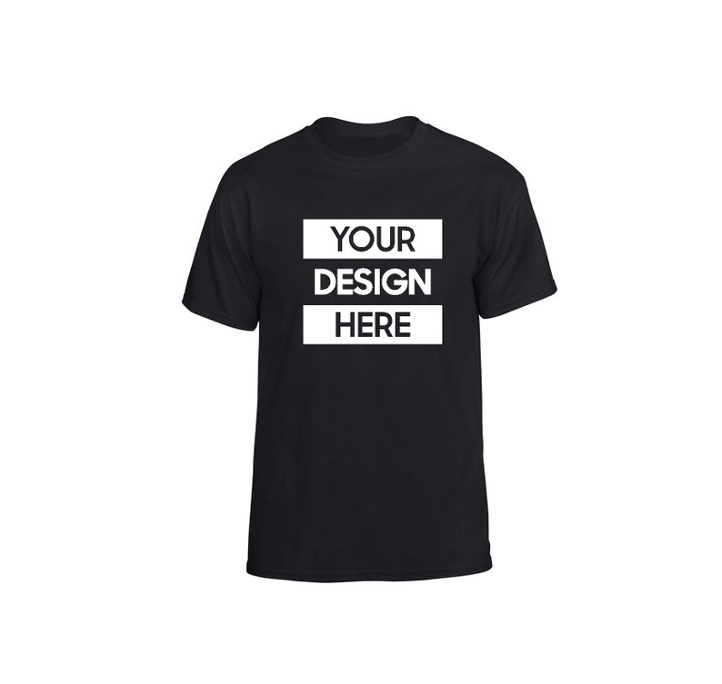 May include: Black crew neck t-shirt with the text "YOUR DESIGN HERE" in a white rectangular box. The text is stacked in three lines. The t-shirt is a basic style, suitable for custom designs or everyday wear.
