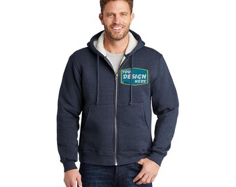 Könnte beinhalten: Ein dunkelblauer Fleece-Kapuzenpullover mit Sherpa-Futter. Der Hoodie hat eine Fronttasche und einen Reißverschluss. Der Hoodie hat einen rechteckigen Patch auf der Vorderseite mit der Aufschrift "Your Design Here".