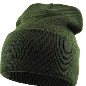 May include: A dark green knitted beanie hat. The hat is folded down at the top and has a ribbed texture.