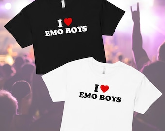 May include: Two cropped t-shirts with the text "I ♥ EMO BOYS" printed on them. One shirt is black and the other is white.