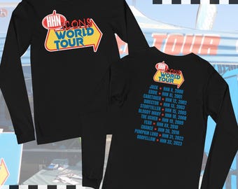 May include: Black long-sleeve shirt with a red, yellow, and blue graphic of a sign that says "HHN Icons World Tour". The back of the shirt lists the names of the "Icons" from each year of the event, starting with Jack from HHN X in 2000 and ending with Oddfellow from HHN 32 in 2023.