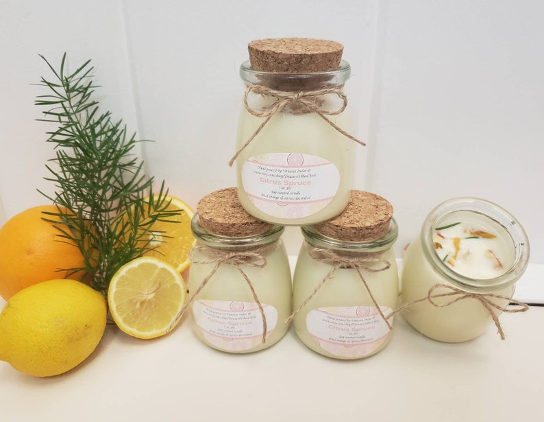 7 oz citrus spruce scented soy wax candle.