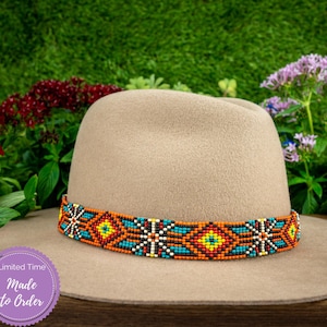 May include: A tan felt fedora hat with a beaded band. The band is made of colorful beads in shades of orange, blue, yellow, white, and black. The band features a geometric pattern.  "Limited Time Made to Order" is written on a purple circle sticker.
