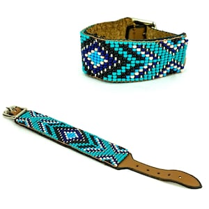May include: A turquoise, blue, and black beaded dog collar with a brown leather strap and silver buckle.