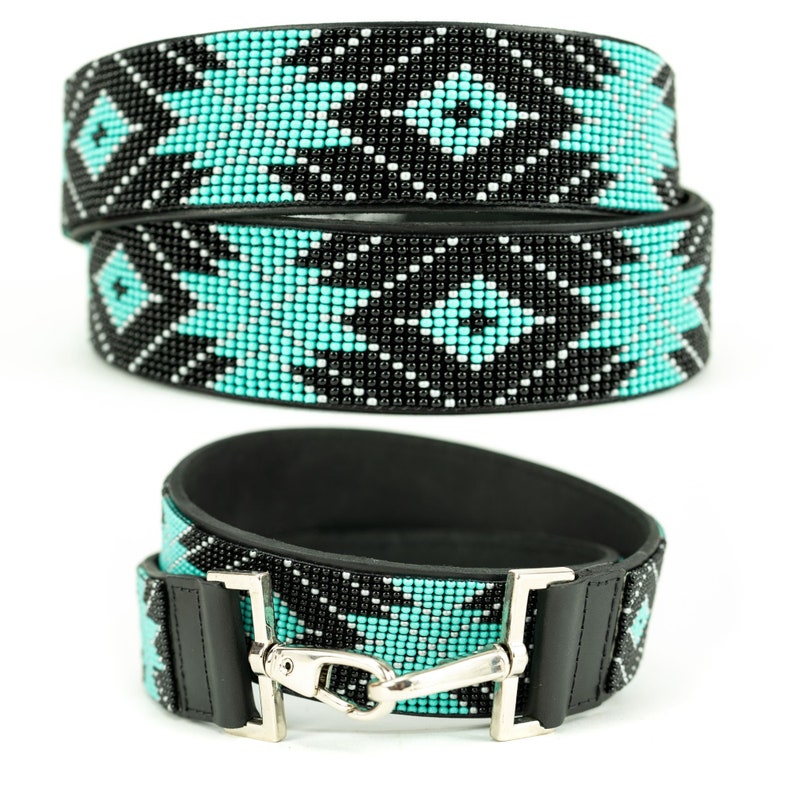 May include: A turquoise and black beaded belt with a geometric pattern. The belt is made of leather and has a silver buckle.