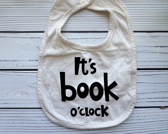 Its Book o’clock baby bib, Reading Books Library themed baby gift, Books baby shower gifts, Baby