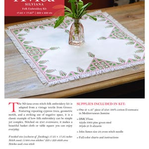 May include: A white cross-stitch folk embroidery kit with green and pink geometric patterns, featuring the text "Avlea Silviana Folk Embroidery Kit". The kit includes fabric, floss, a needle, and instructions. Finished size is 17.25 x 17.25 inches.