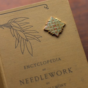 Enamel pin needleminder Knotwork by Avlea Folk Embroidery embroidery cross stitch notion tool image 1