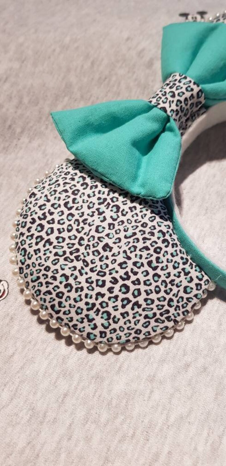 Beautiful alternative animal print mickey ears in turquoise green
