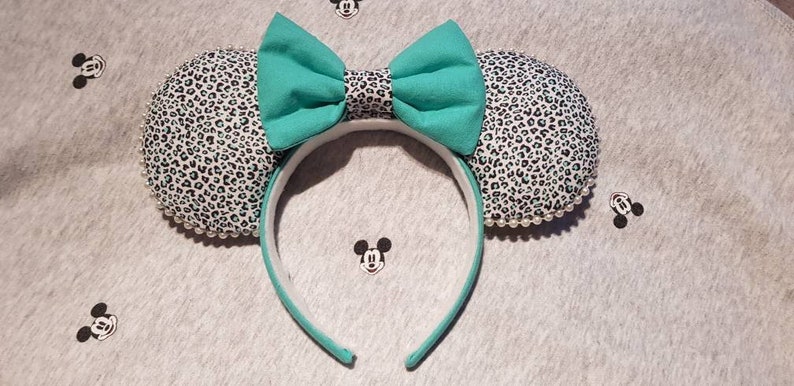 Beautiful alternative animal print mickey ears in turquoise green