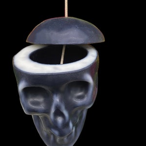 Loadable Uncrossing Skull Candle + Desenvolvimiento