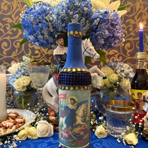 Ogou Sen Jak Boutey + Ogou Balendyo + Ogou Saint Jacques + Protection + Justice + Bottle + Product of Haiti + Spiritual Art + One of a Kind
