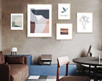 May include: Five framed art prints on a light brown wall. The prints feature abstract shapes, a bird, a sunset, and a line drawing of a flower. The prints are arranged in a grid pattern.