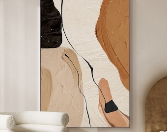 May include: Abstract art print with brown, beige, and black shapes on a white background. The print has a textured look and a modern style.
