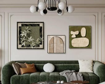 May include: An interior design scene featuring a dark green velvet sofa, a round coffee table, and three framed abstract art pieces. A black chandelier with white globe lights hangs above. The artwork includes botanical and geometric designs in neutral and green tones.