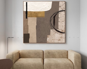 May include: Abstract art print with geometric shapes in shades of brown, beige, and gold. The print features a black circle with a white outline and a black line.