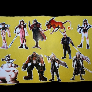May include: A collection of colorful stickers featuring characters from the Final Fantasy video game series. The stickers include Cloud, Sephiroth, Tifa, Aerith, and others.