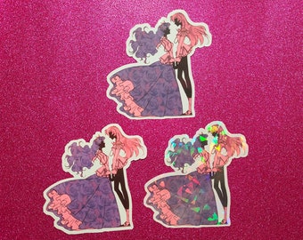 May include: Three holographic stickers featuring a couple in a romantic pose. The stickers are on a pink glitter background. The couple is dressed in formal attire and is holding hands. The stickers are perfect for adding a touch of whimsy to your laptop, water bottle, or planner.