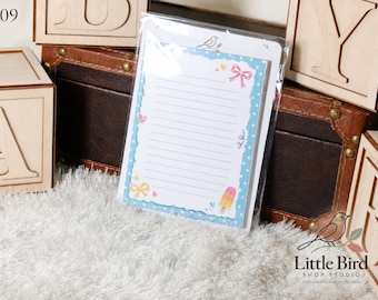 Seasonal Memo Pad, 4.25 x 5.5 Lined Notepad, 50 Sheets, 19 Holiday Designs
