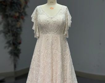 Stunning Plus size/ Curvy, Beaded Flutter sleeves Lace A line Wedding Dress. Also available in Black and Red color.