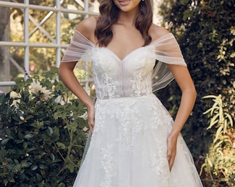 Stunning Off the shoulder Lace A line Wedding Dress.