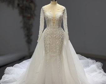 Stunning Beaded long Sleeves Mermaid Detachable Wedding Dress. Also available in Black and Red color.