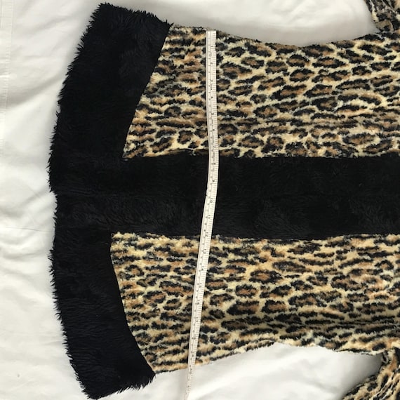 Vintage 2000’s leopard print faux fur jacket