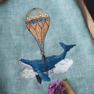 Whale with balloon