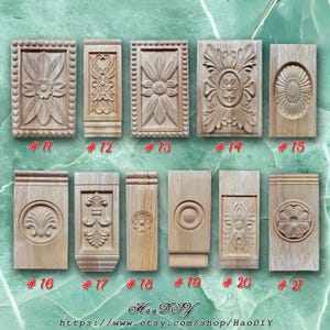 Puede incluir: Una colección de 11 apliques decorativos de madera con varios diseños tallados. Los apliques están dispuestos en dos filas, con los números del 11 al 15 en la fila superior y del 16 al 21 en la fila inferior. Los apliques están hechos de madera de color claro y tienen un acabado natural.