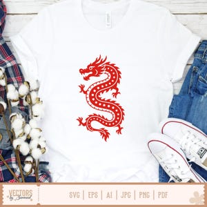 May include: White t-shirt featuring a red dragon design. The dragon is stylized with a curved body and dotted details. The shirt is paired with blue jeans and white sneakers. The image also includes the text "VECTORS by Sarmad" and file type options.