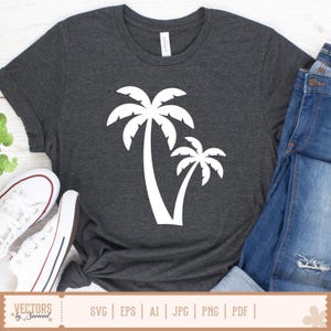 Op de afbeelding: Donkergrijs t-shirt met een witte afbeelding van twee palmbomen. Het shirt wordt gecombineerd met een blauwe jeans en witte sneakers. De onderkant van de afbeelding bevat de tekst "VECTORS by Sarmad" en bestandstype-opties.
