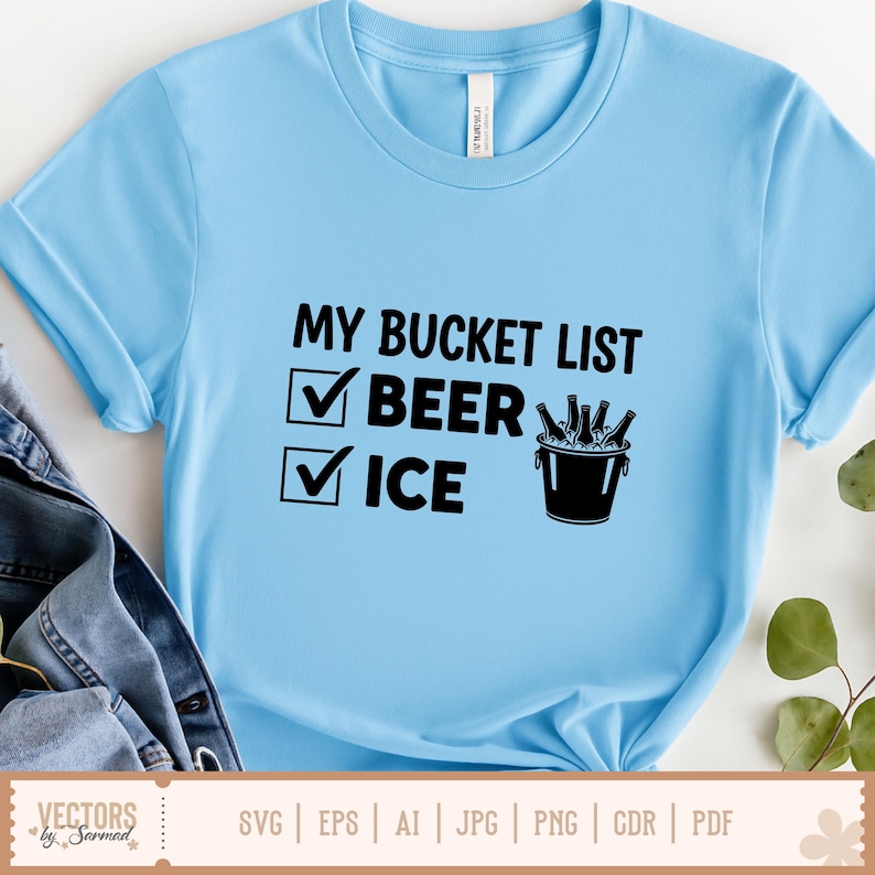 May include: Light blue t-shirt with the text "MY BUCKET LIST" and check boxes next to "BEER" and "ICE". A black bucket with beer bottles is also shown. The shirt has rolled-up sleeves.
