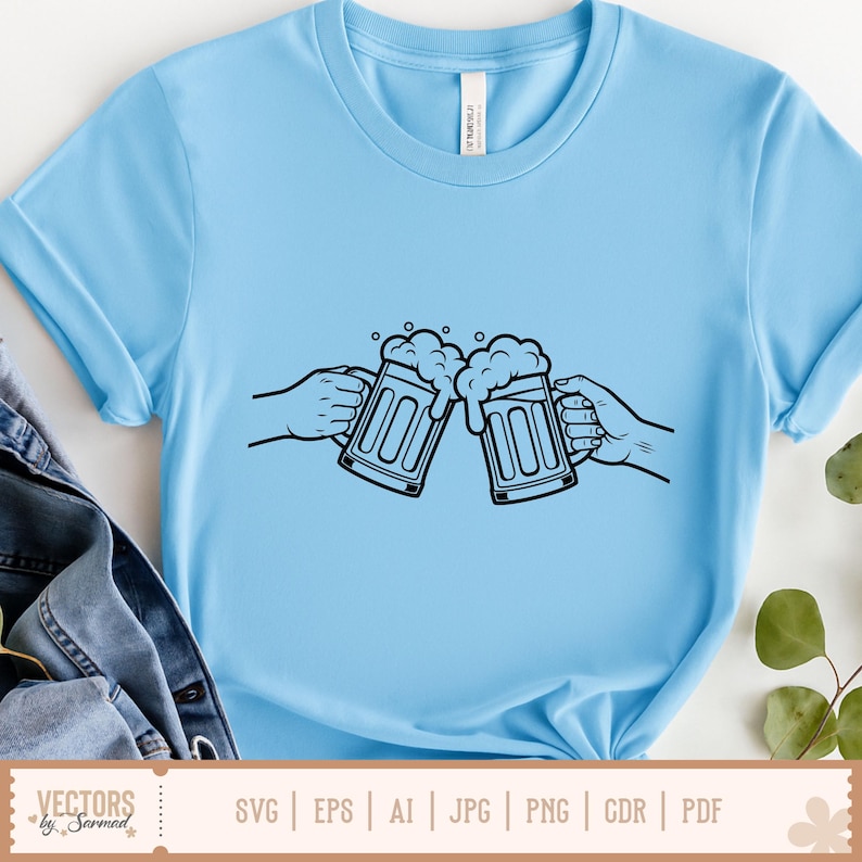 May include: Light blue t-shirt featuring a black and white illustration of two hands clinking beer mugs. The mugs are filled with beer and foam. The shirt has rolled-up sleeves. The bottom of the shirt has the text "SVG | EPS | AI | JPG | PNG | CDR | PDF".