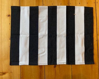 Black and white thick stripe layered rug