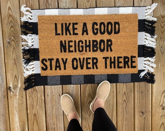 Like a good neighbor stay over there doormat, funny doormat