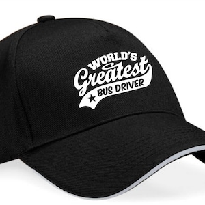 May include: Black baseball cap with a white embroidered design that says "World's Greatest Bus Driver".