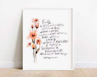 Può includere: Una stampa incorniciata con una composizione floreale ad acquerello nei toni dell'arancione e del marrone. L'opera d'arte include un testo scritto a mano da Filippesi 4:8, che incoraggia i pensieri positivi. La cornice è bianca.