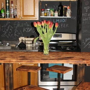Handmade craft wooden table from reclaimed wood. Rustic wooden table. Handmade furniture. Reclaimed wood.