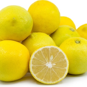May include: A pile of fresh, ripe lemons, with a bright yellow color and textured skin. One lemon is cut in half, revealing the juicy interior. The lemons are a healthy food item.
